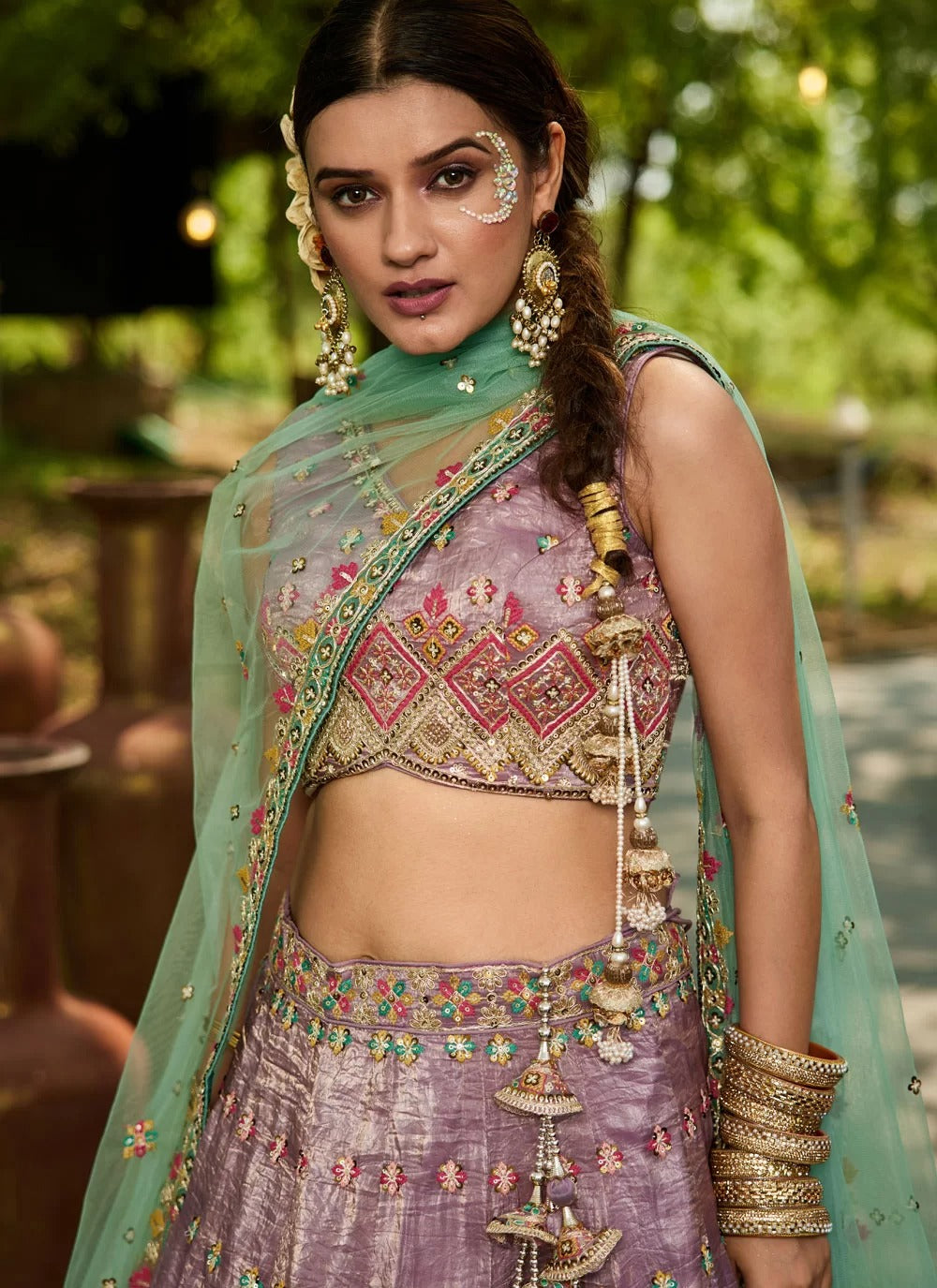 Lavender embroidered silk wedding wear lehenga choli with mirror work