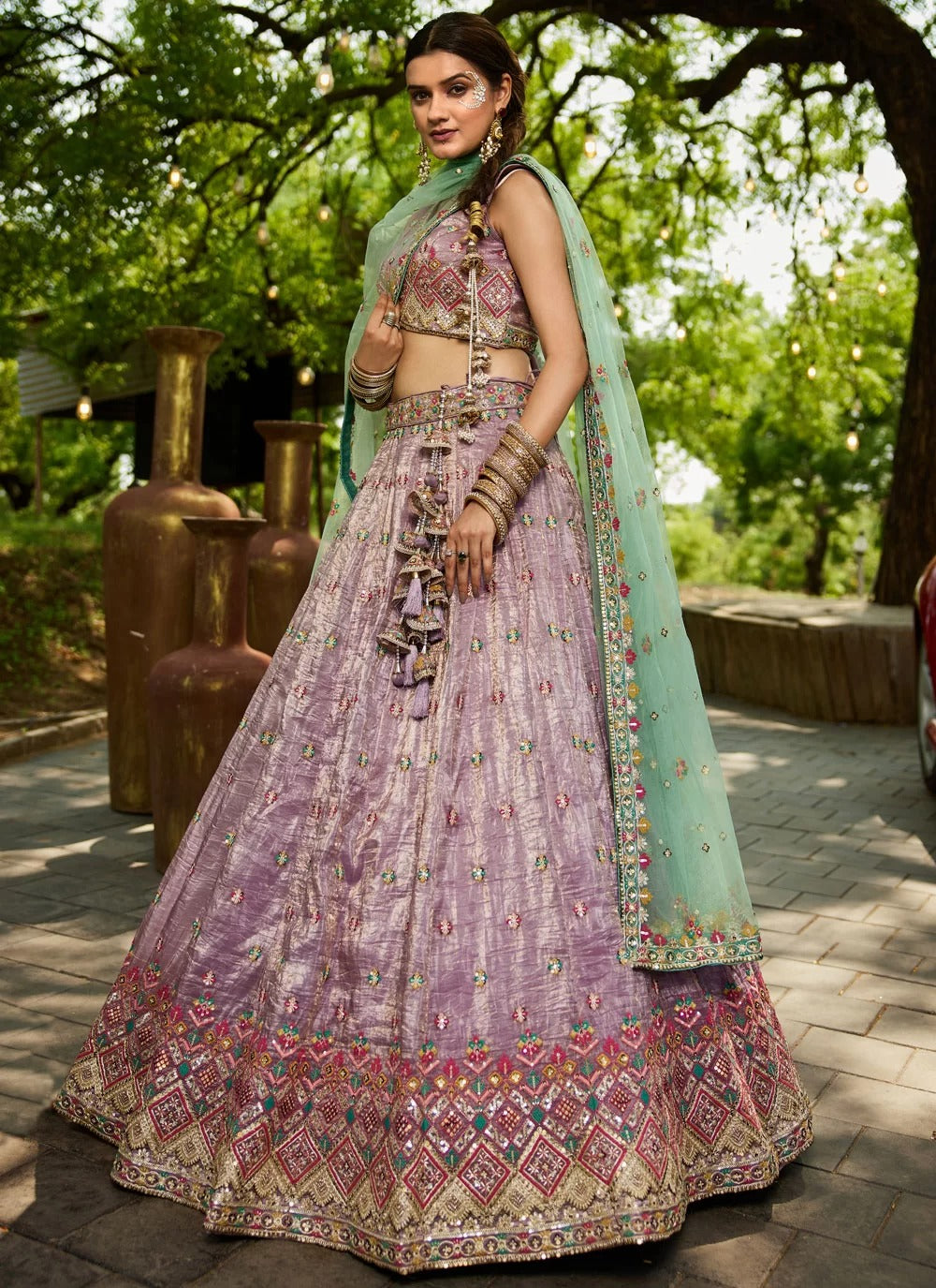 Lavender embroidered silk wedding wear lehenga choli with mirror work
