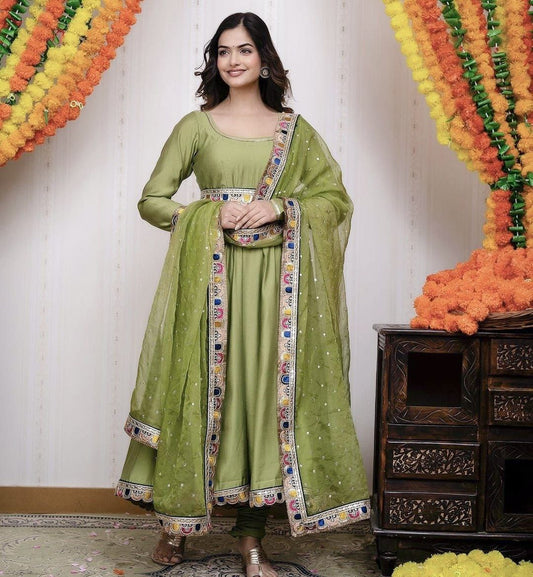 Light Green Luxurious Chinon Silk Embroidered Gown with Flowing 8 Meter Flair