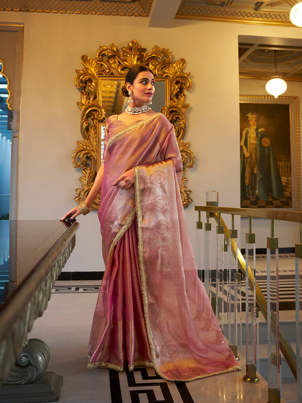 Light pink zari weaving tissue shimmer saree with sequins lace border