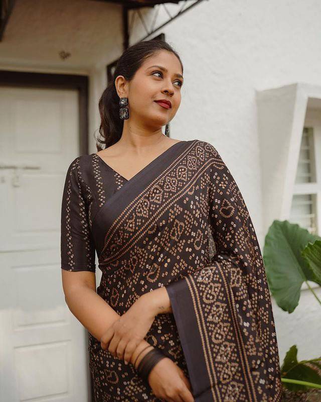 Black pure cotton linen saree weaved with zari comes with tassels