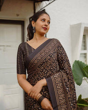 Black pure cotton linen saree weaved with zari comes with tassels