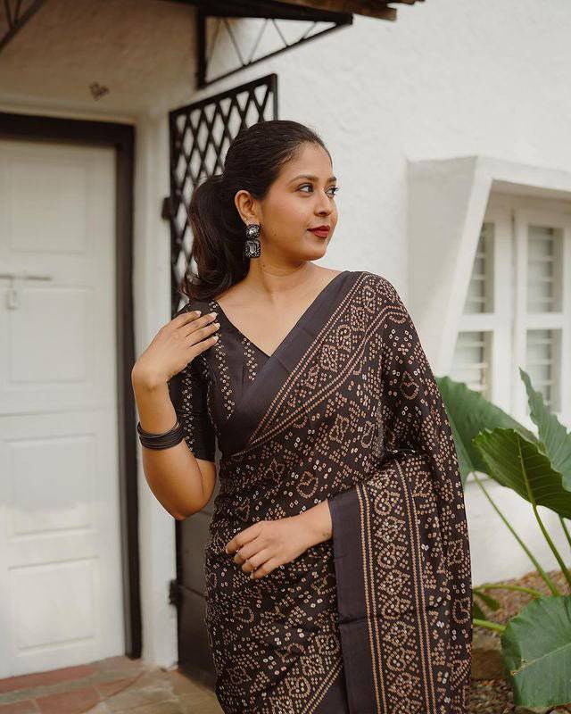Black pure cotton linen saree weaved with zari comes with tassels