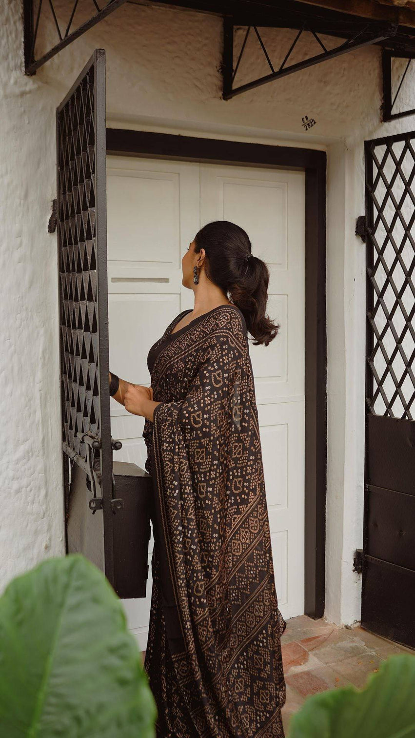 Black pure cotton linen saree weaved with zari comes with tassels