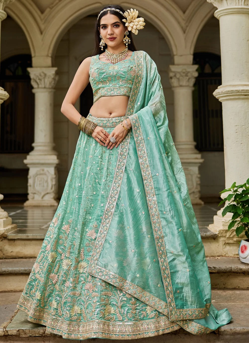 Lustrous sea green tissue wedding wear lehenga with sequins embroidery