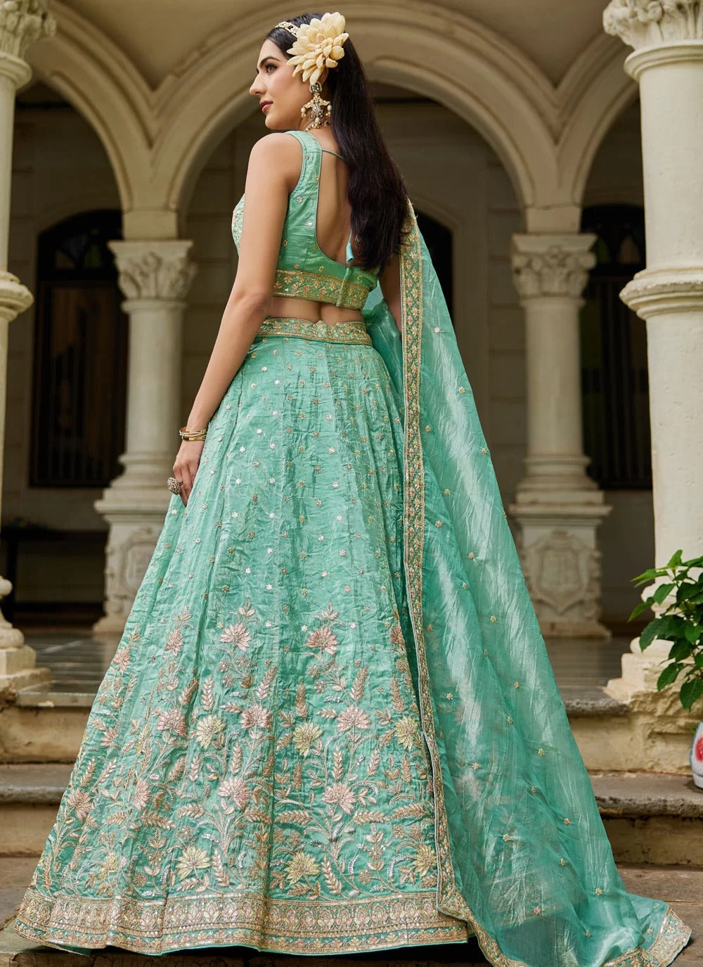 Lustrous sea green tissue wedding wear lehenga with sequins embroidery
