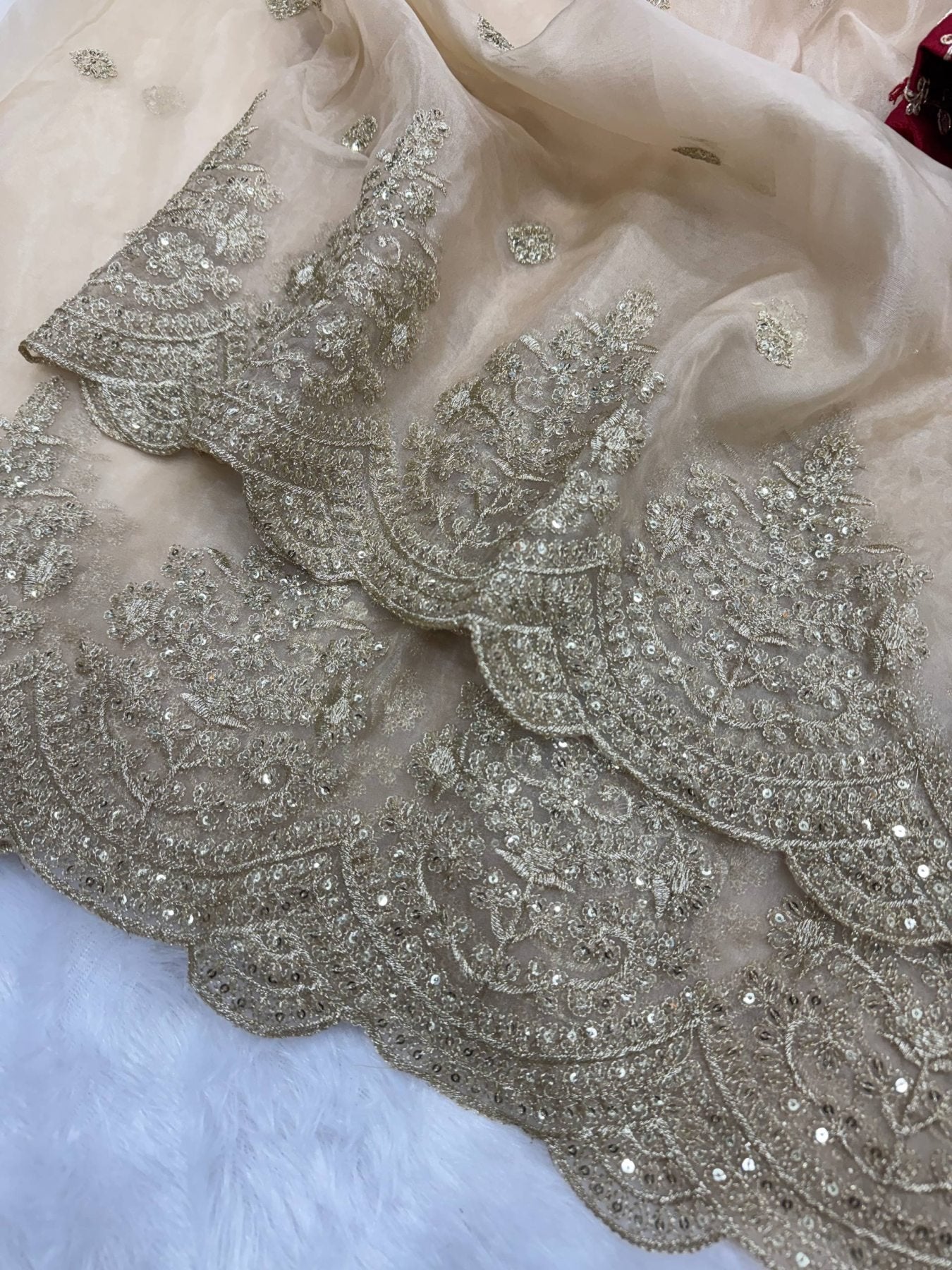 Gold Organza Saree with Sequins Red Corset Blouse for Grand Celebrations