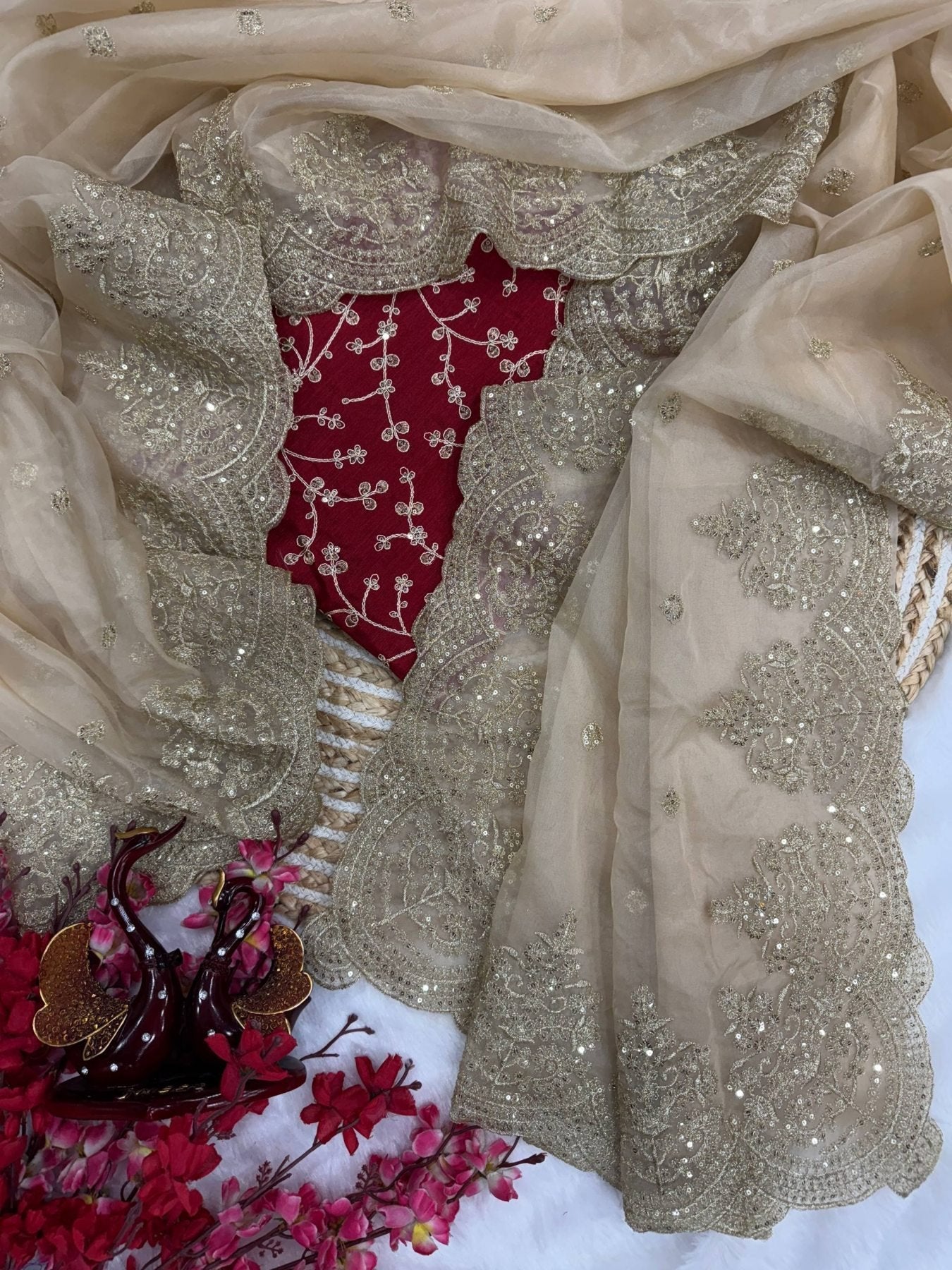 Gold Organza Saree with Sequins Red Corset Blouse for Grand Celebrations