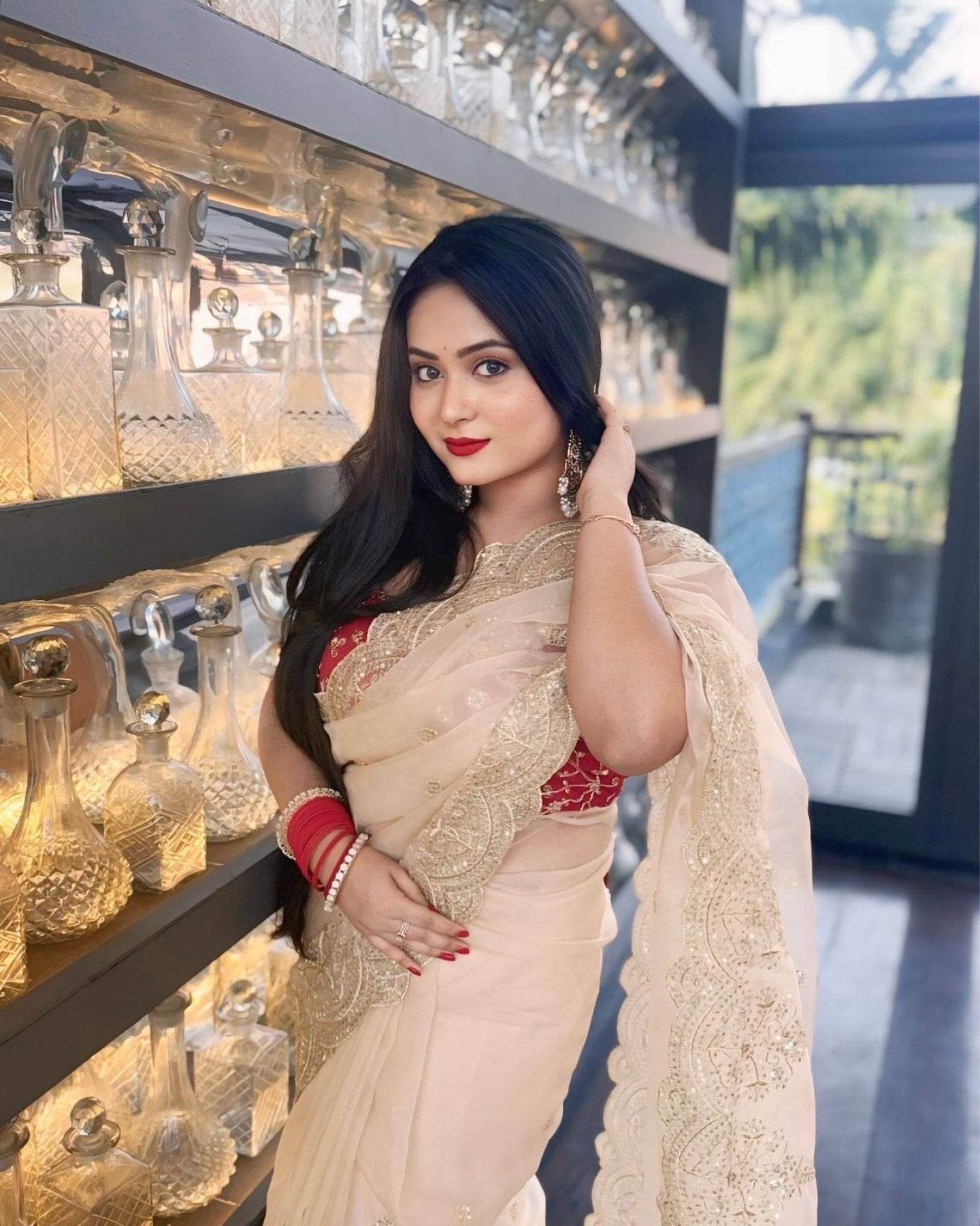 Gold Organza Saree with Sequins Red Corset Blouse for Grand Celebrations
