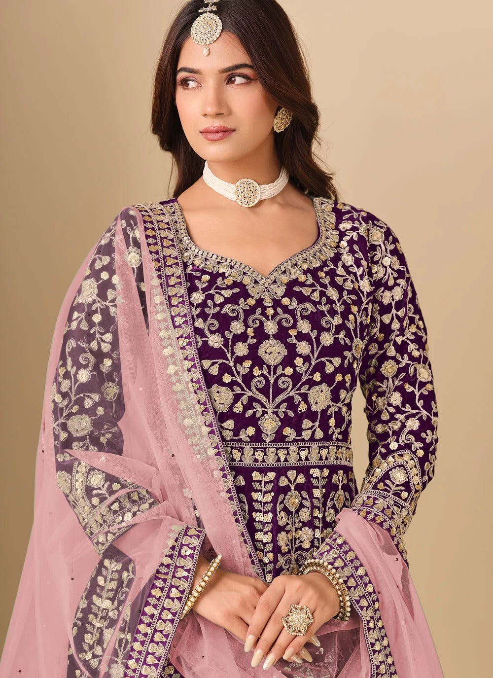 Luxurious purple velvet anarkali suit with front back embroidery