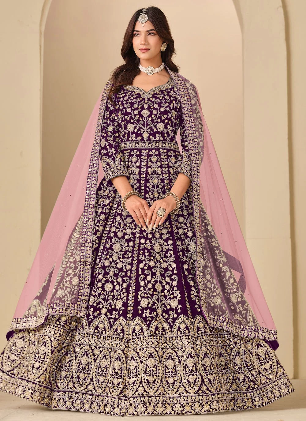 Luxurious purple velvet anarkali suit with front back embroidery