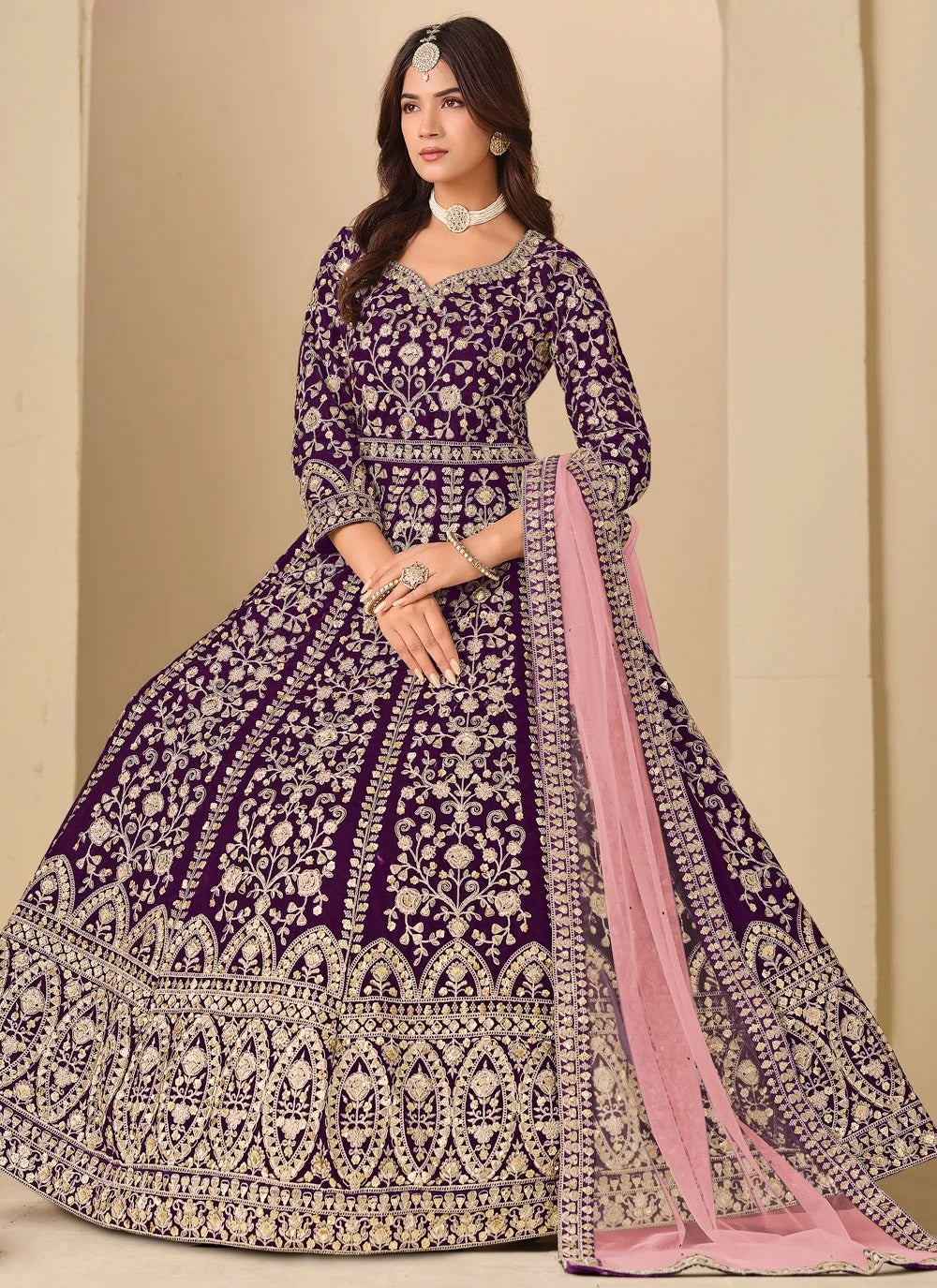Luxurious purple velvet anarkali suit with front back embroidery