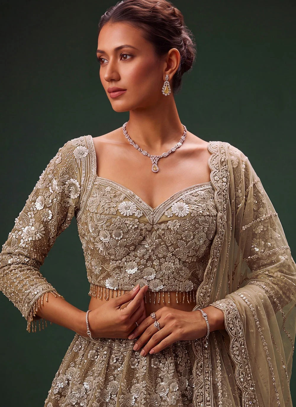 Golden bridal reception lehenga for bride with sequins dori embroidery