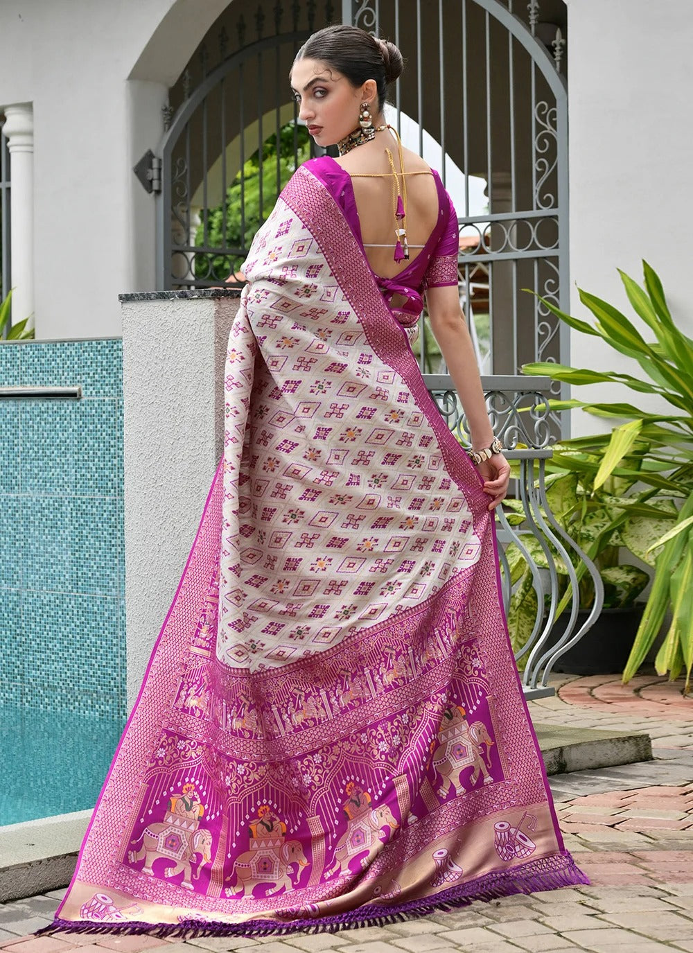 Magenta banarasi silk patola saree with ajrakh zari weaving pallu