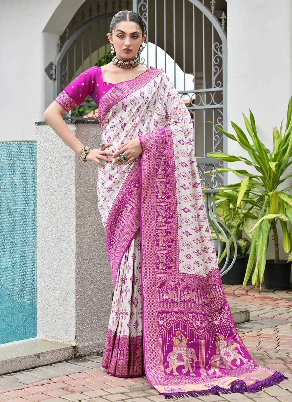 Magenta banarasi silk patola saree with ajrakh zari weaving pallu