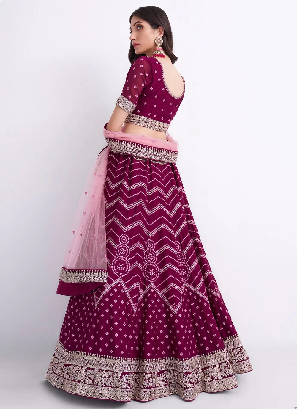 Magenta silky georgette sequins embroidered and zarkan work lehenga
