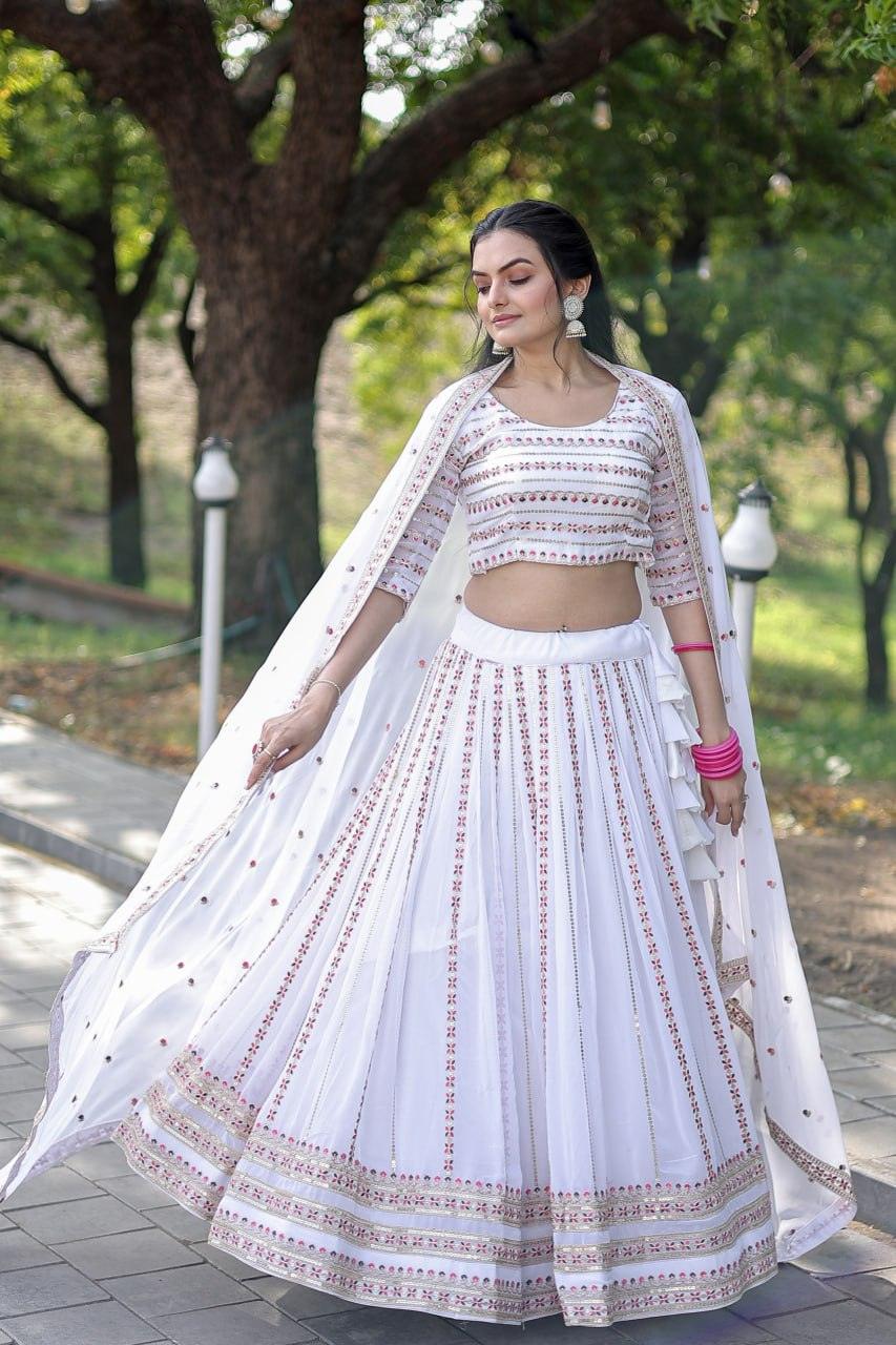 Magnetic White Faux Georgette Coding Embroidered Lehenga Set