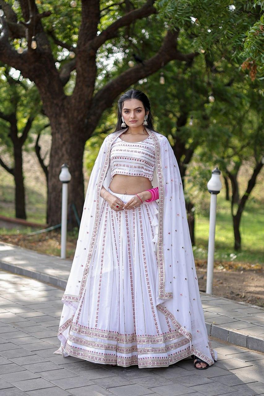 Magnetic White Faux Georgette Coding Embroidered Lehenga Set