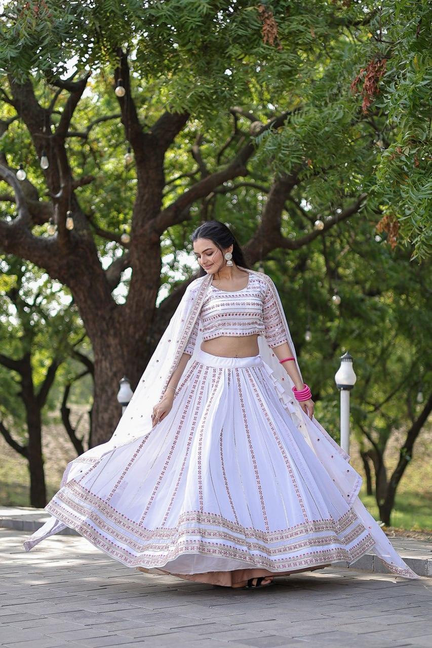 Magnetic White Faux Georgette Coding Embroidered Lehenga Set