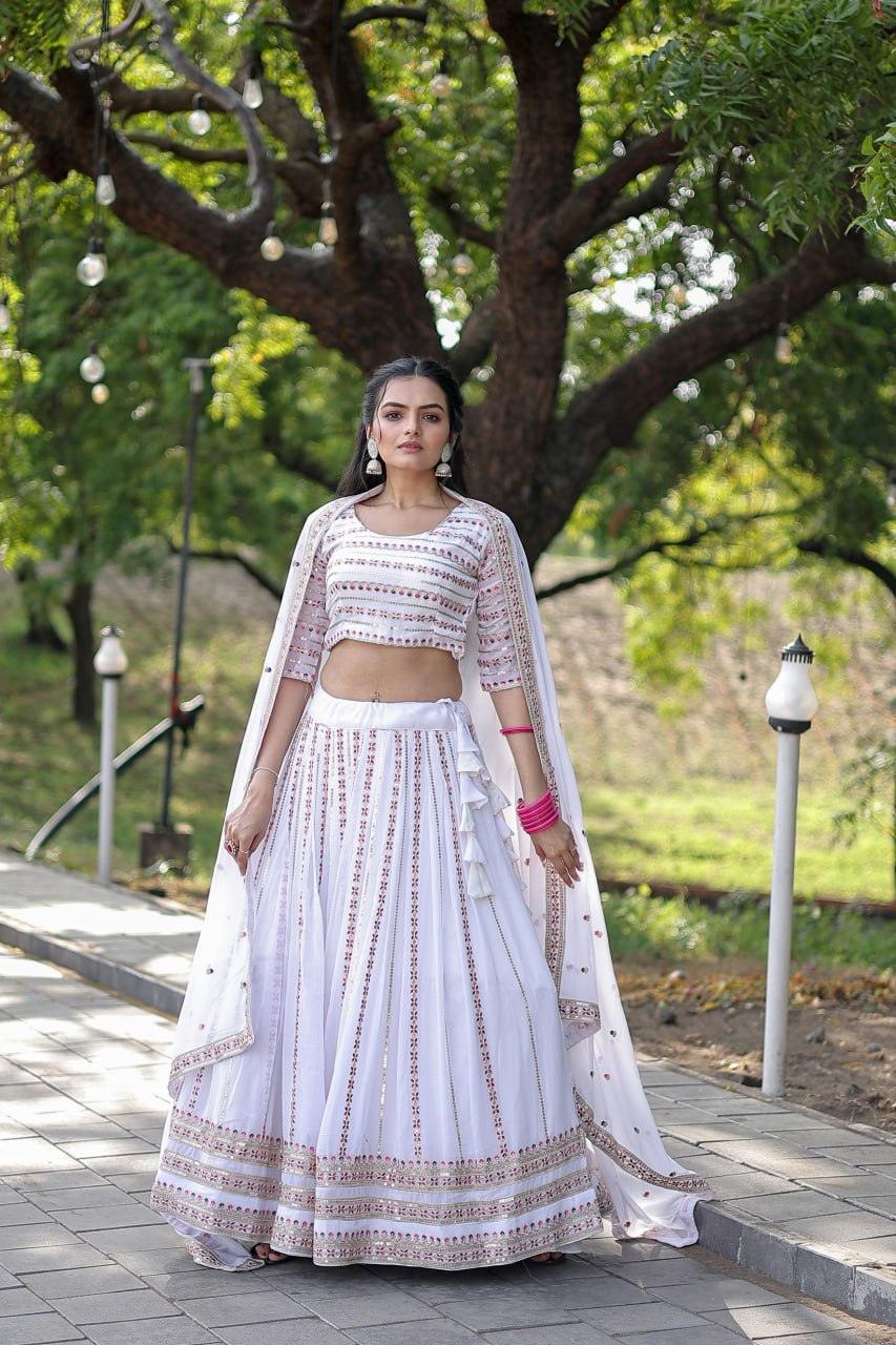 Magnetic White Faux Georgette Coding Embroidered Lehenga Set