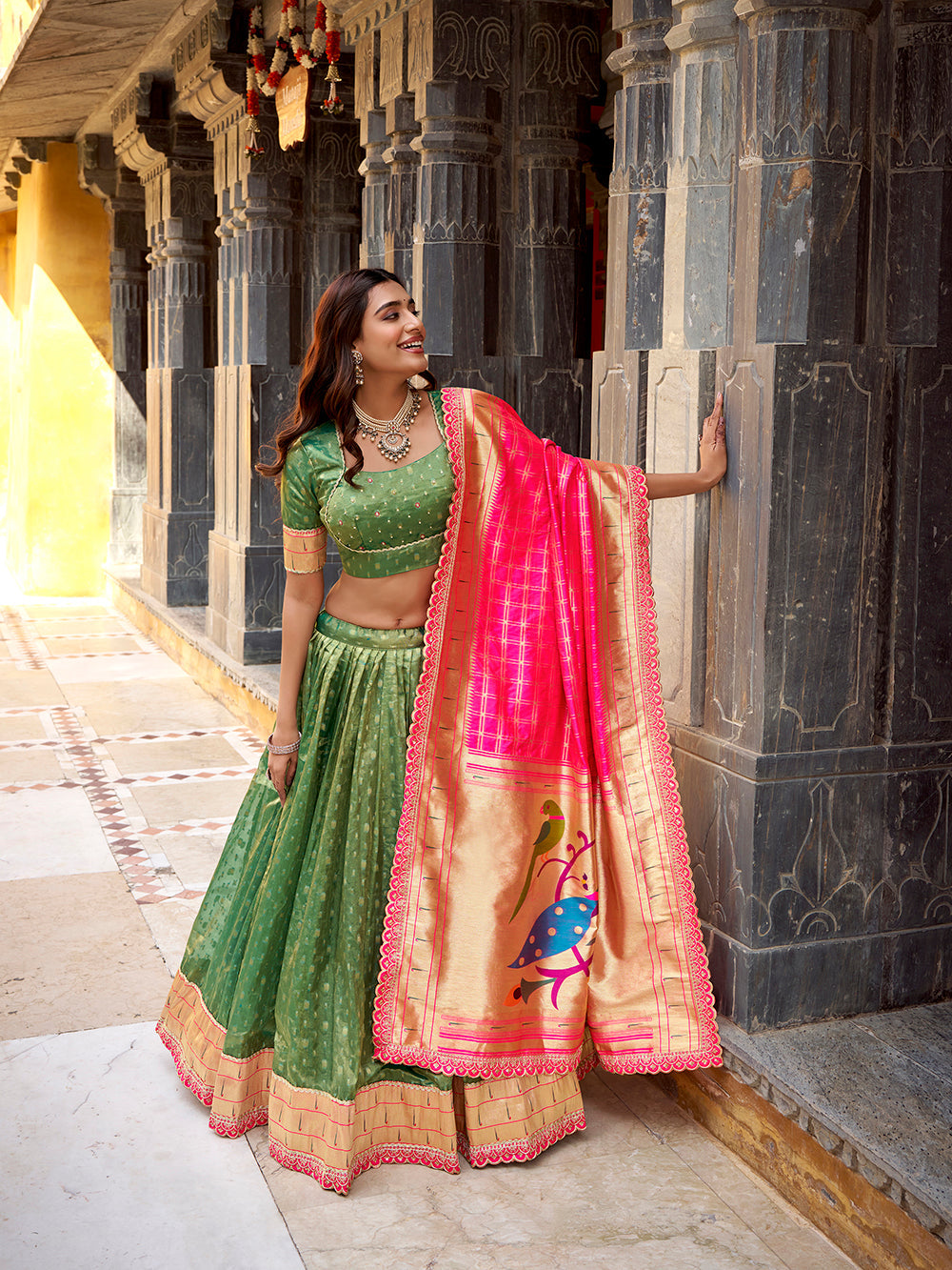 Green shimmer organza lehenga choli with zari weaving paithani dupatta purse