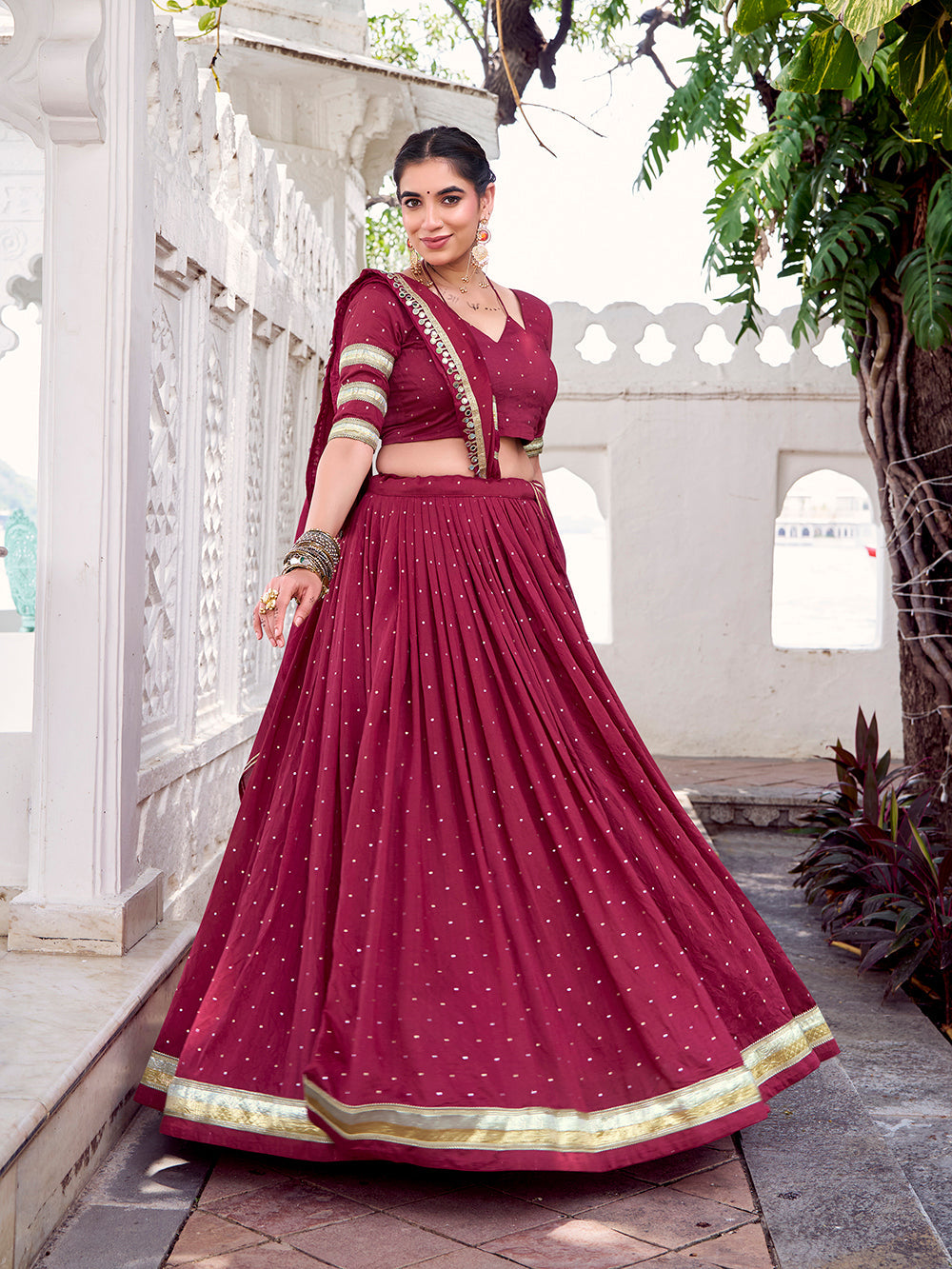 Maroon chanderi zari weaving lehenga choli with embossed lace dupatta