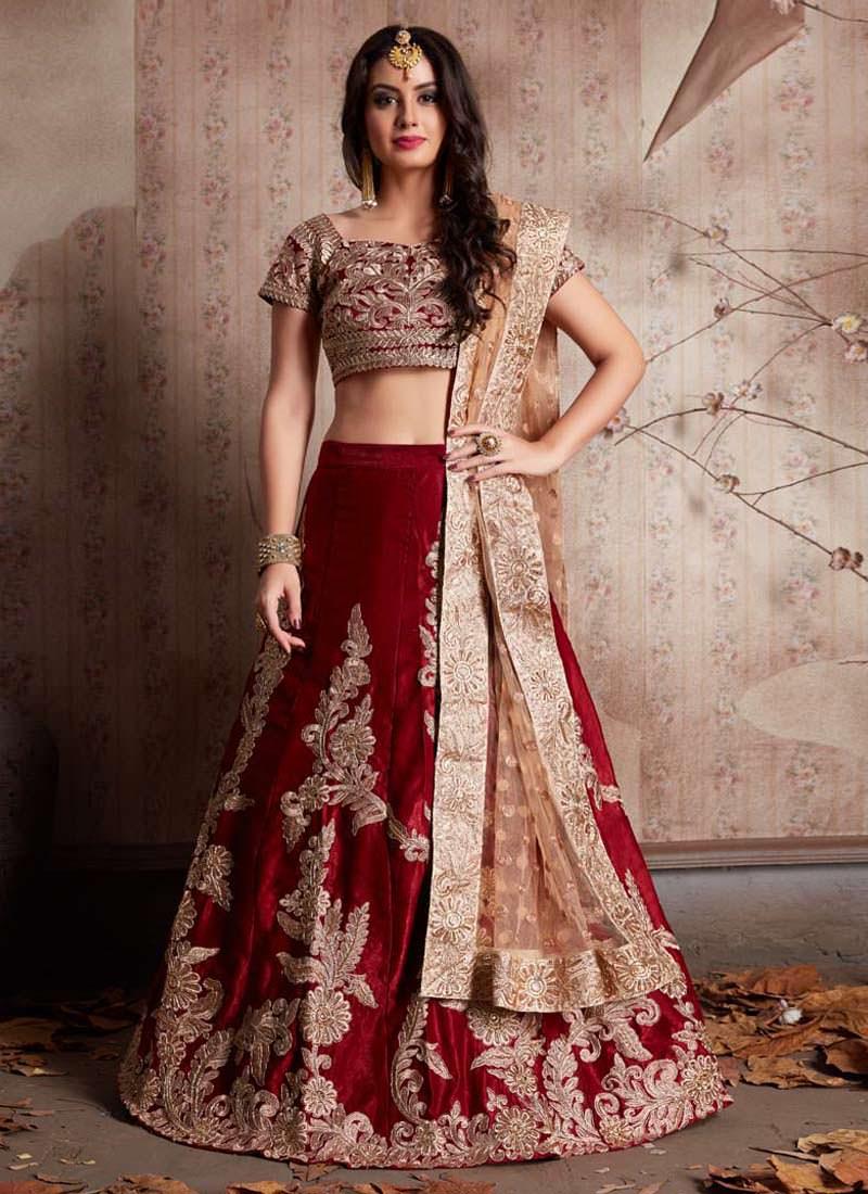 Maroon Heavily Embroidered Velvet Base Lehenga Choli