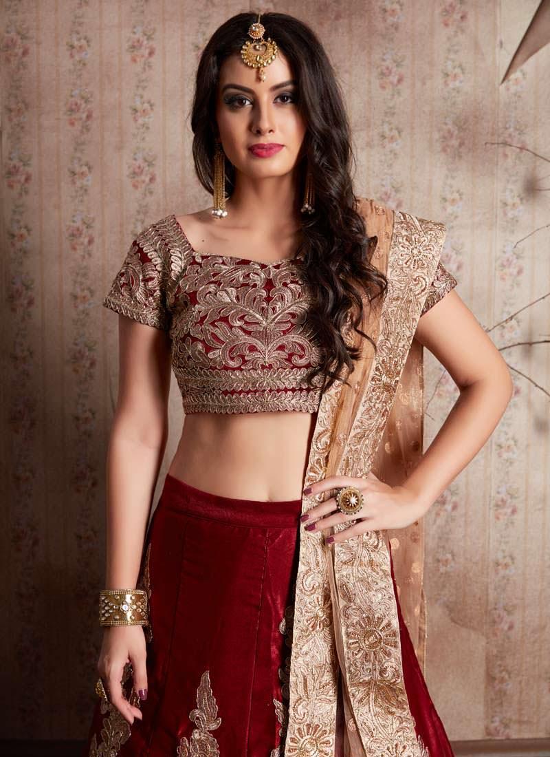 Maroon Heavily Embroidered Velvet Base Lehenga Choli