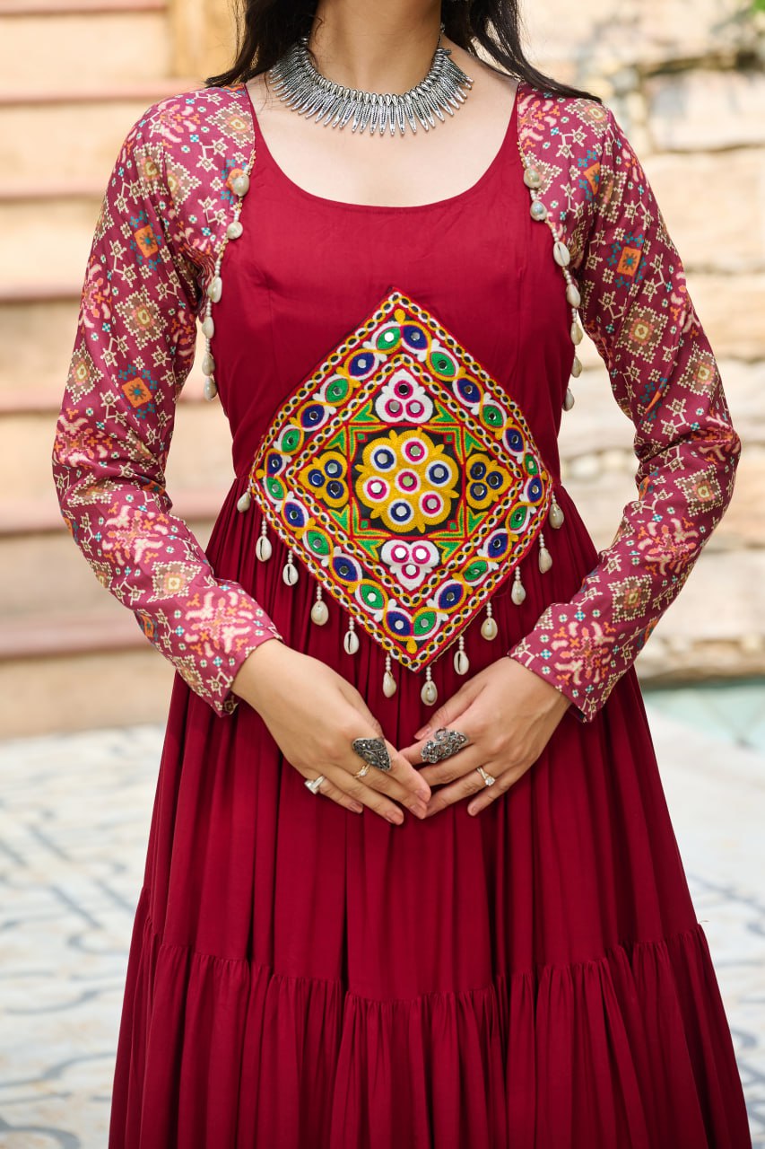 Maroon Navratri Special Gown with Kutchi Gamthi Embroidery – 3 Layer Frill & 12 Meter Flair