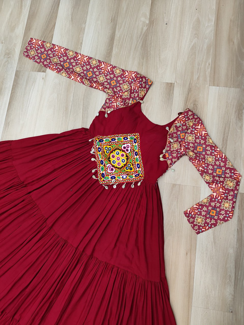 Maroon Navratri Special Gown with Kutchi Gamthi Embroidery – 3 Layer Frill & 12 Meter Flair
