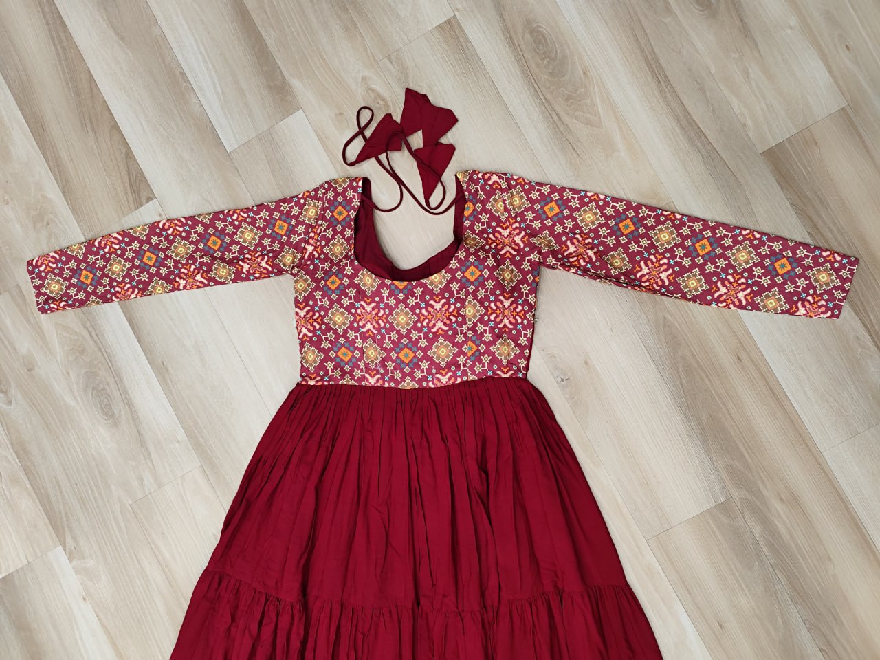 Maroon Navratri Special Gown with Kutchi Gamthi Embroidery – 3 Layer Frill & 12 Meter Flair