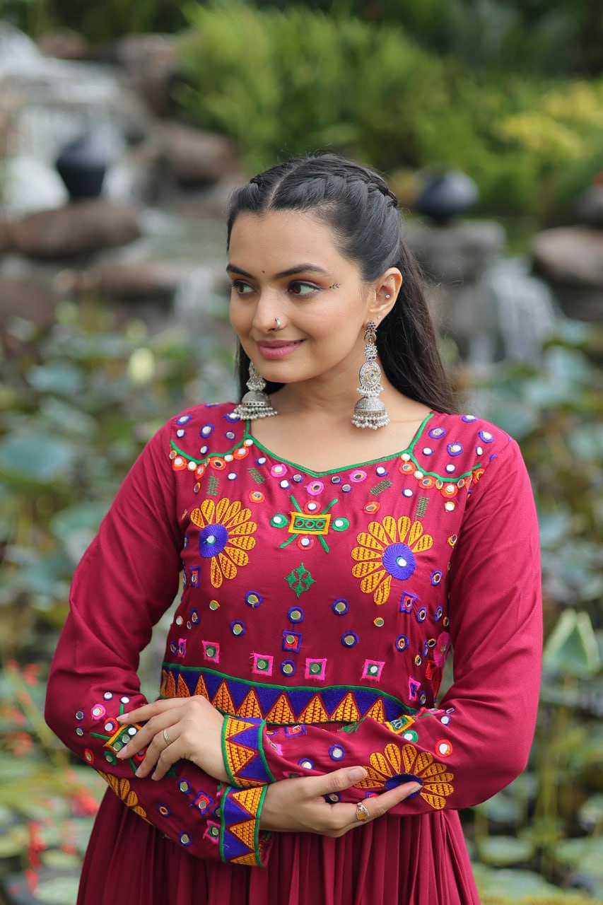 Maroon Navratri Special Kutchi Gamthi Work Gown in 14 Kg Rayon with 4-Layer Frill & Full Sleeves