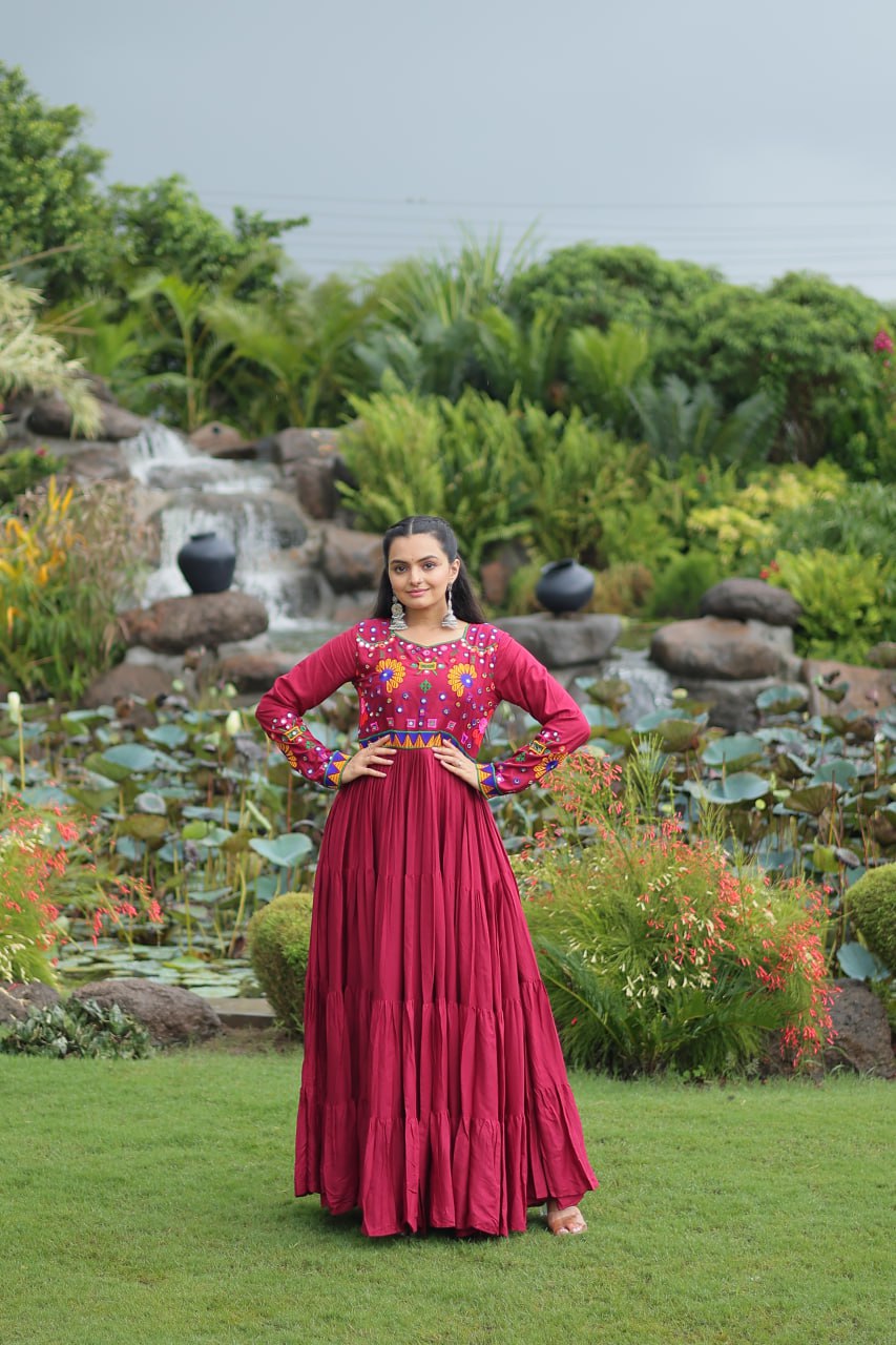 Maroon Navratri Special Kutchi Gamthi Work Gown in 14 Kg Rayon with 4-Layer Frill & Full Sleeves