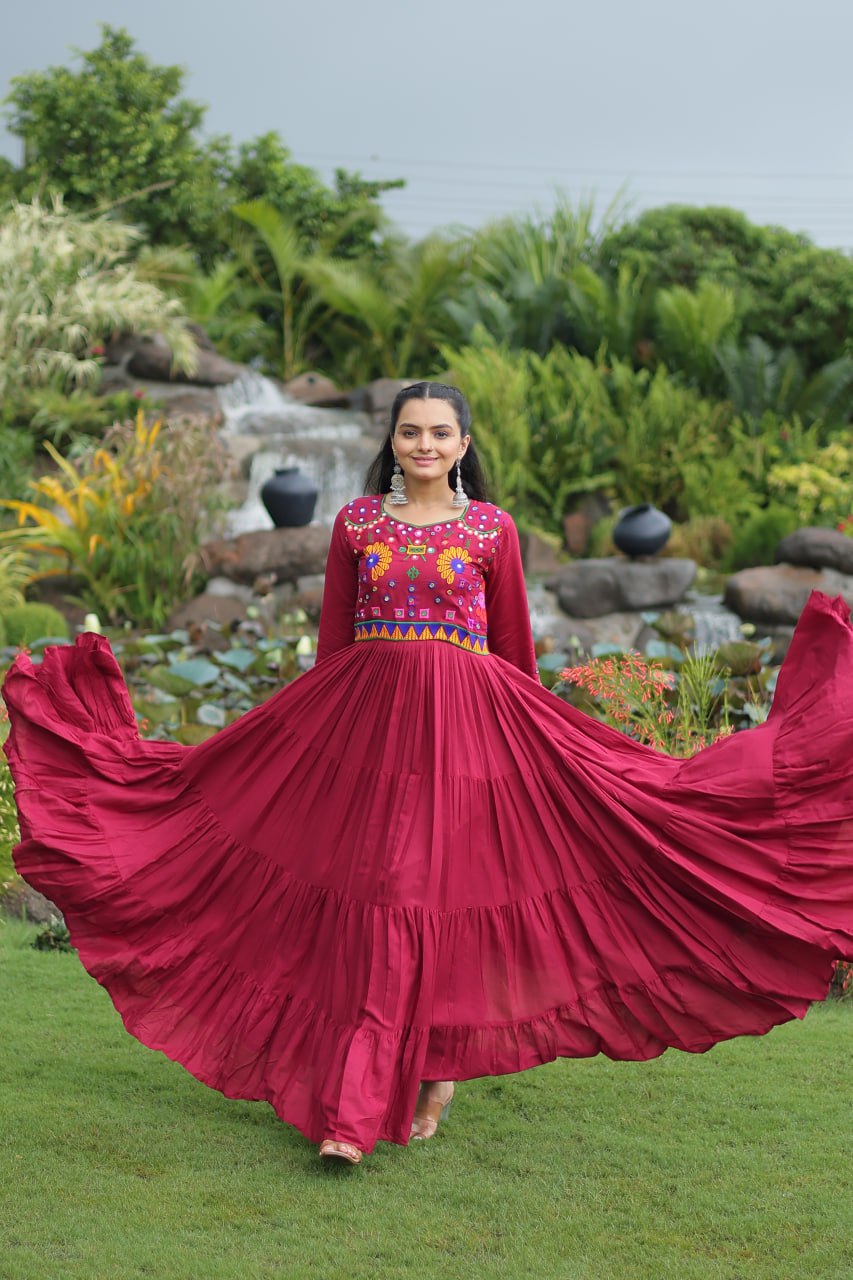 Maroon Navratri Special Kutchi Gamthi Work Gown in 14 Kg Rayon with 4-Layer Frill & Full Sleeves