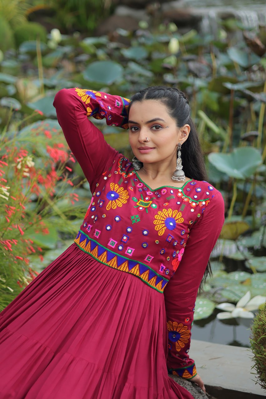 Maroon Navratri Special Kutchi Gamthi Work Gown in 14 Kg Rayon with 4-Layer Frill & Full Sleeves