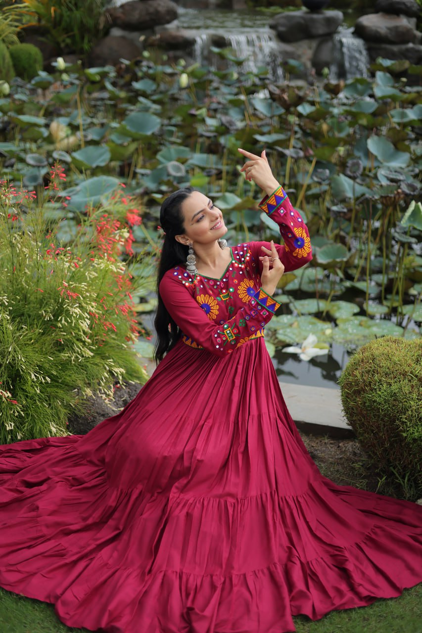 Maroon Navratri Special Kutchi Gamthi Work Gown in 14 Kg Rayon with 4-Layer Frill & Full Sleeves