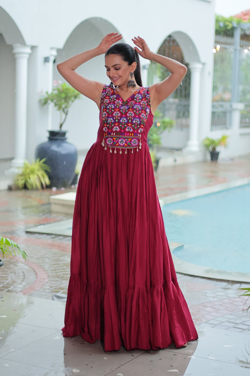 Maroon Rayon Navratri Gown with Kutchi Gamthi Embroidery & Mirror Work – Sleeveless with Flair