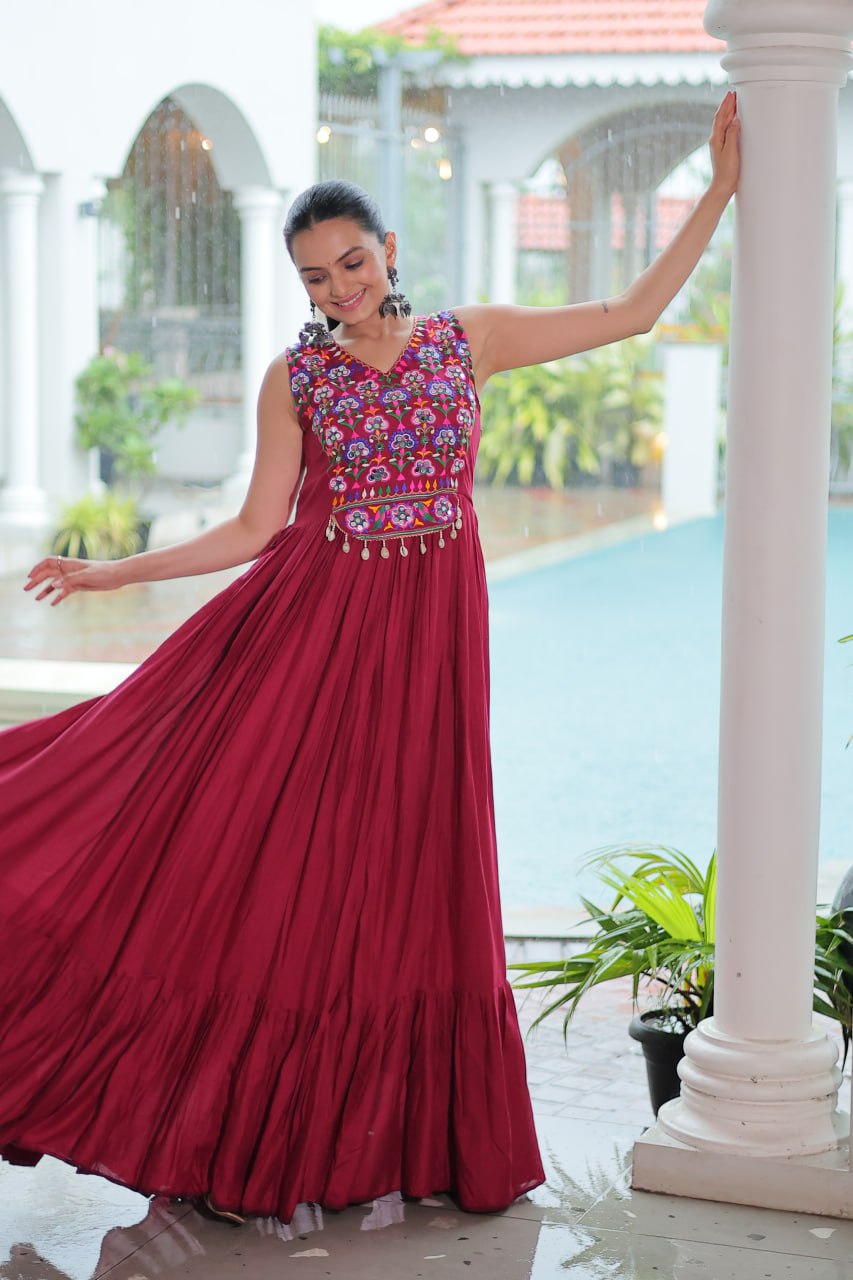 Maroon Rayon Navratri Gown with Kutchi Gamthi Embroidery & Mirror Work – Sleeveless with Flair