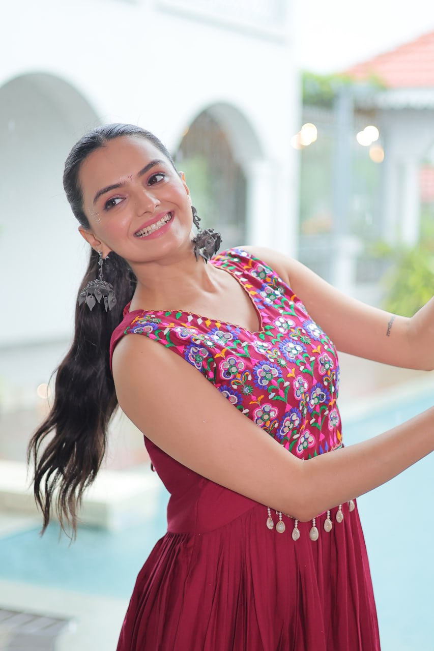 Maroon Rayon Navratri Gown with Kutchi Gamthi Embroidery & Mirror Work – Sleeveless with Flair