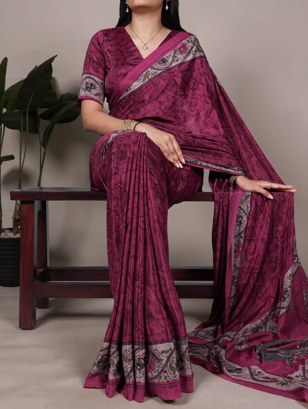 Magenta pink crepe saree with all over print matching blouse