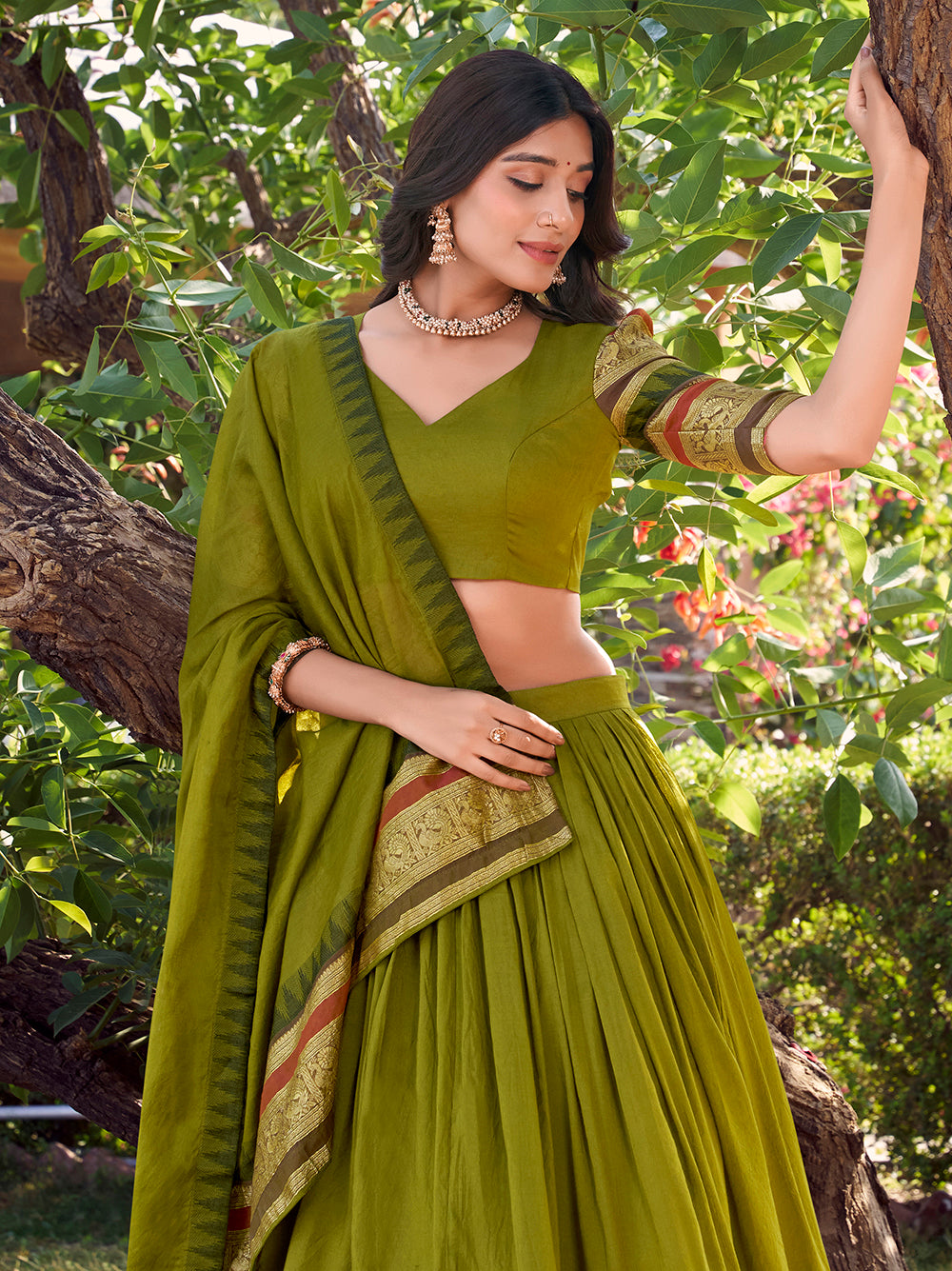Mehandi green chanderi lehenga choli with zari border matching dupatta