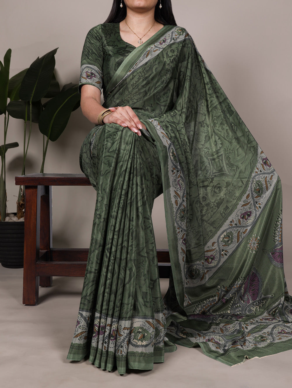 Mehendi color crepe saree with all over print matching blouse