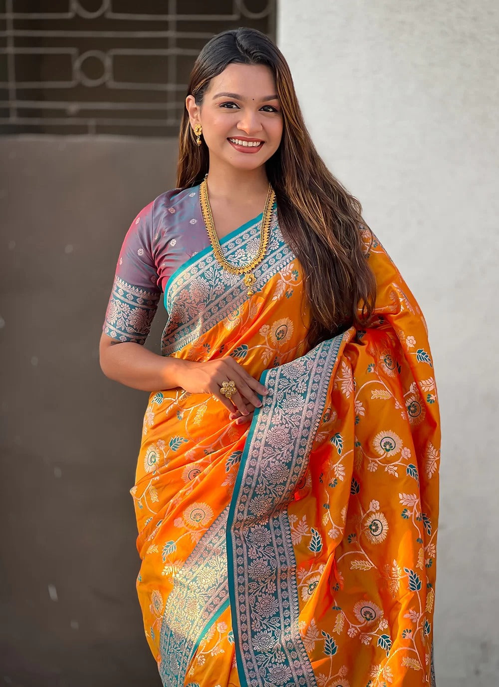 Opulent orange banarasi soft silk saree with rose gold zari