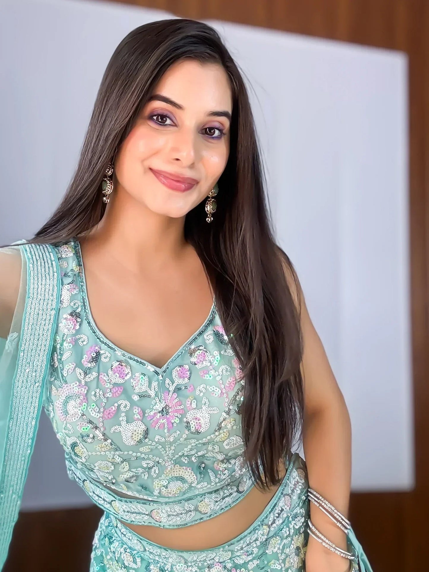 Mesmerizing Sky-Blue Sequins Net Party Wear Lehenga Choli With Dupatta