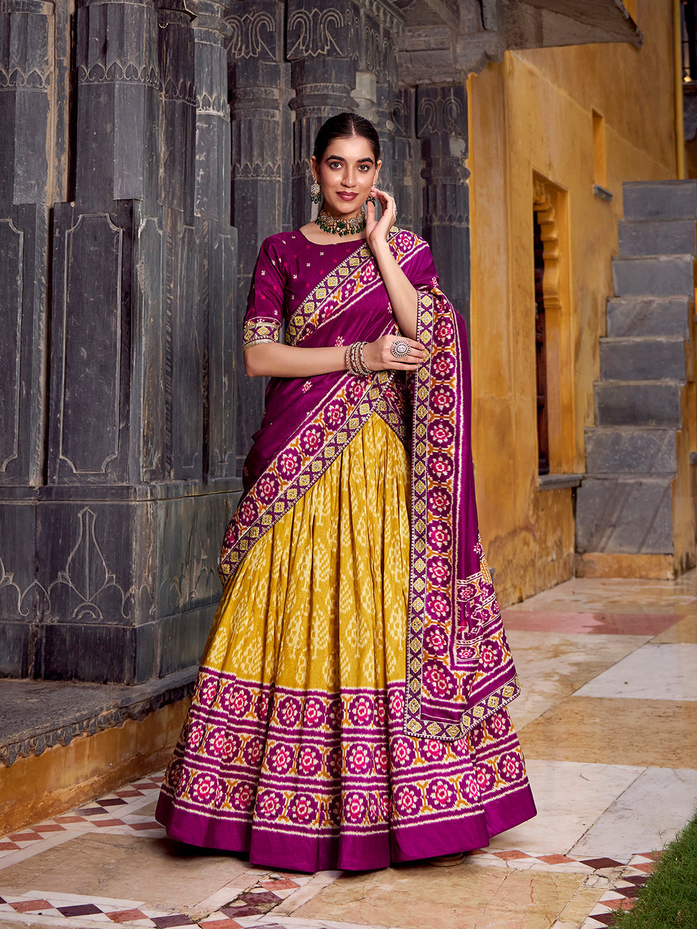 Mustard tasar silk ikat patola print lehenga choli set with wine embroidered blouse dupatta
