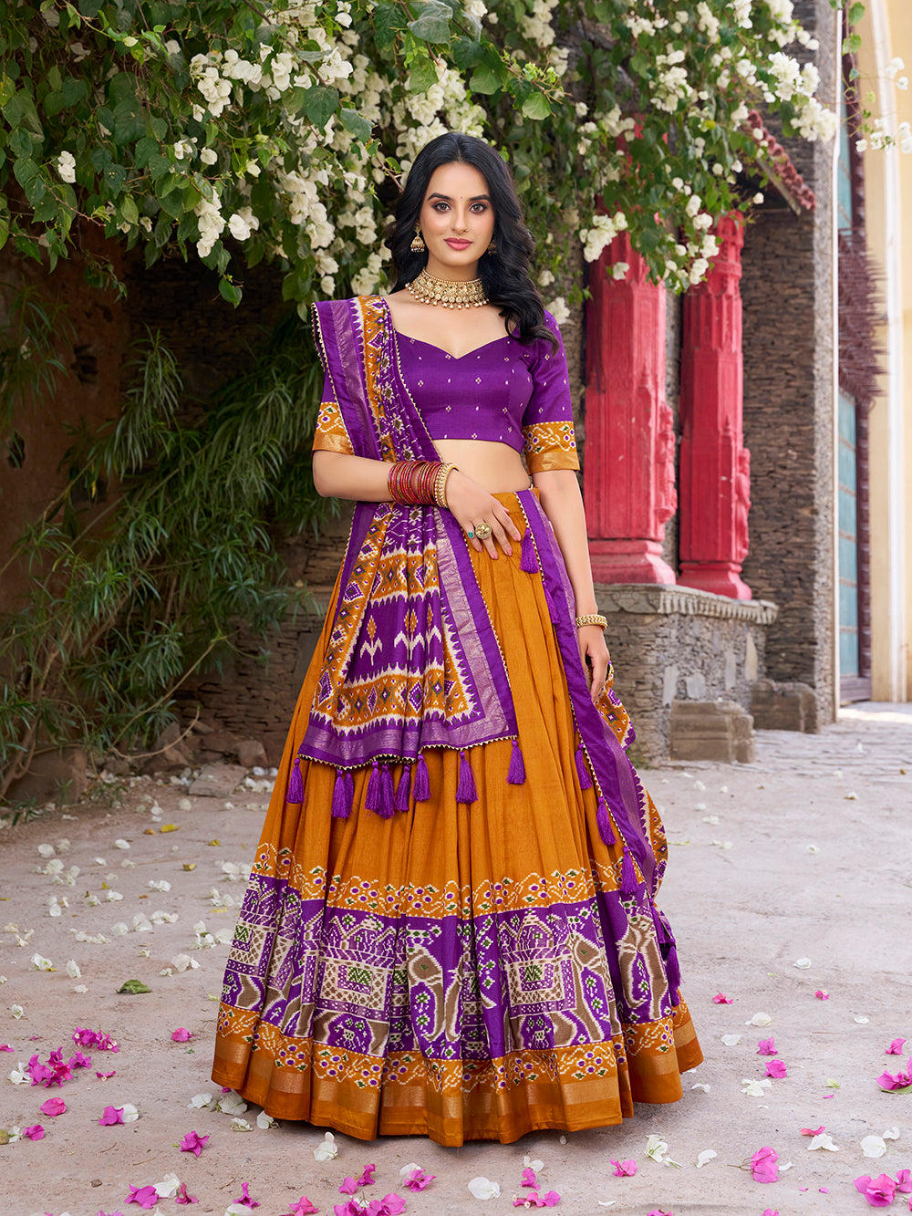 Mustard tasar silk lehenga choli with patola print foil work elegance