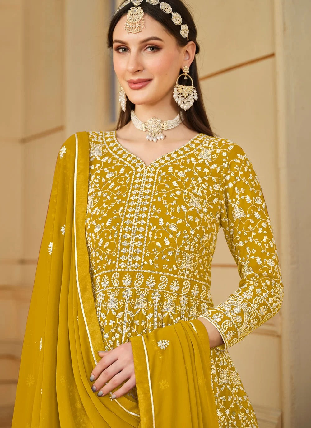 Graceful mustard faux georgette embroidered anarkali suit