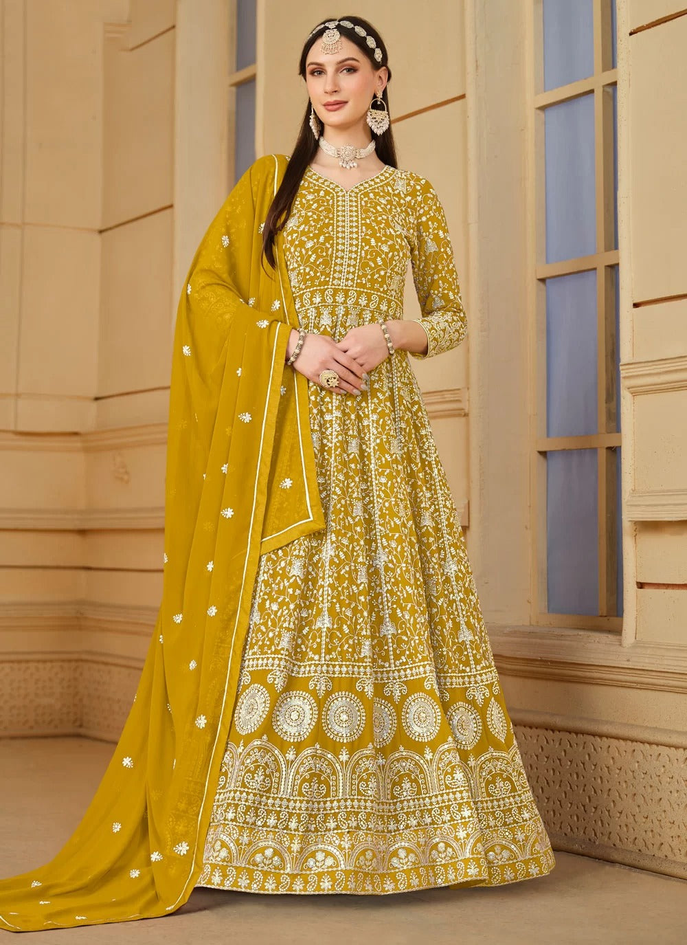 Graceful mustard faux georgette embroidered anarkali suit