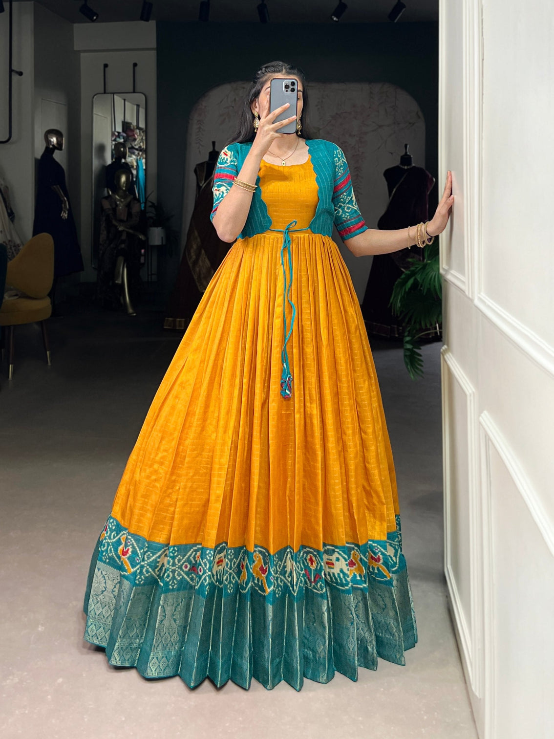 Mustard Patola Print Tasar Chex Gown with Matching Koti – Stitched Ethnic Wear Set with Weaving Border & Micro Cotton Lining