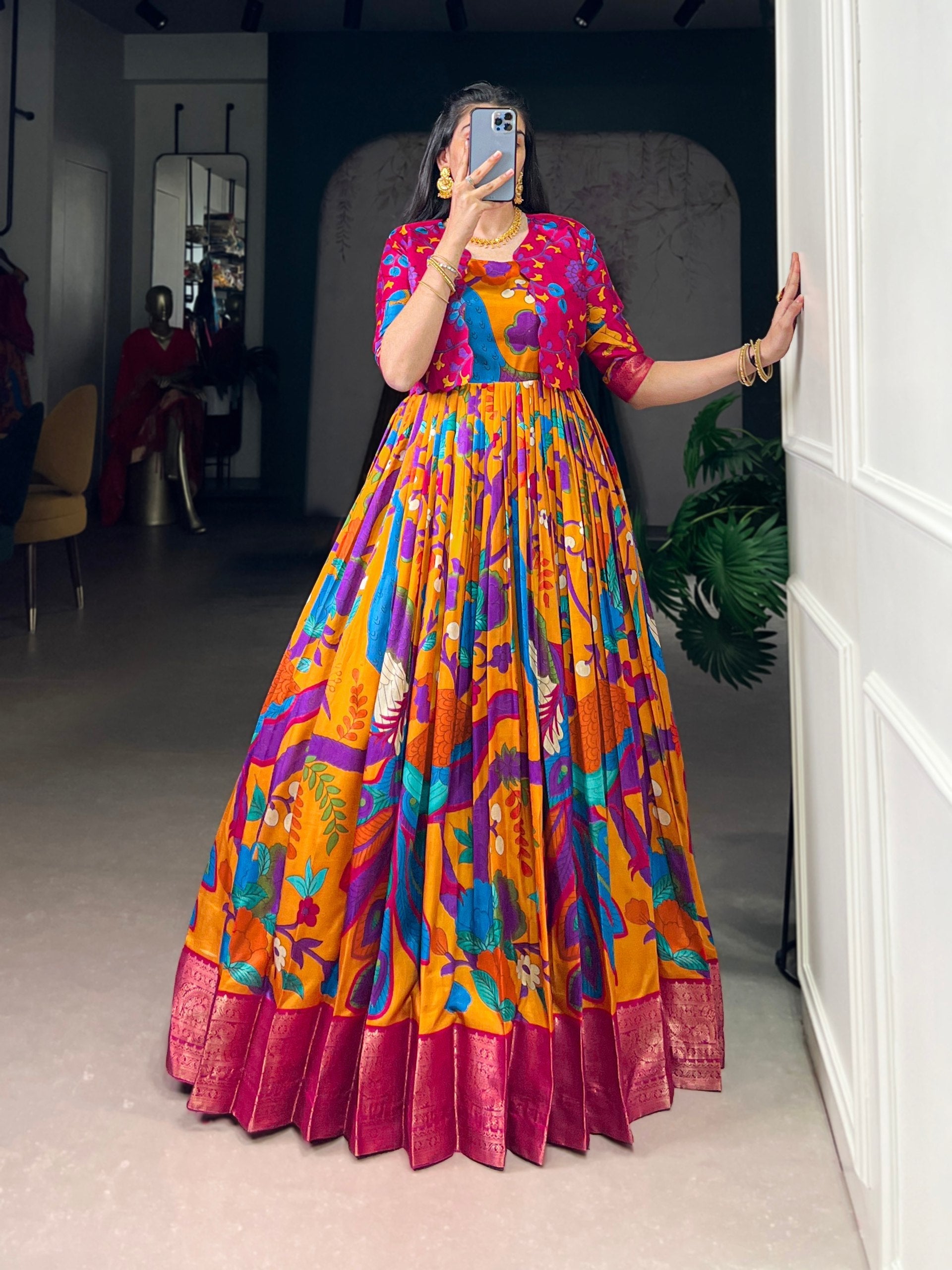 Mustard Tasar Silk Kalamkari Print Stitched Gown with Zari Weaving Koti – Full Flair Party Wear Gown Set for Women